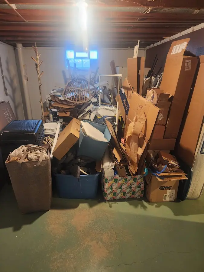 Roll-off dumpster container at job site for 2 Yard Dumpster Rental in Holdenville